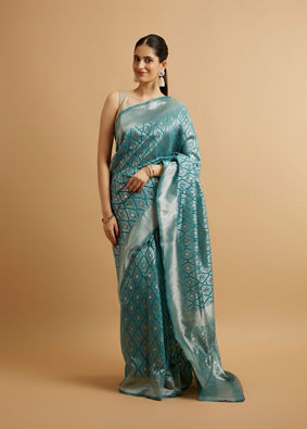 alt message - Mohey Women Light Blue Ikat Diamond Patterned Saree with Floral Motifs image number 0